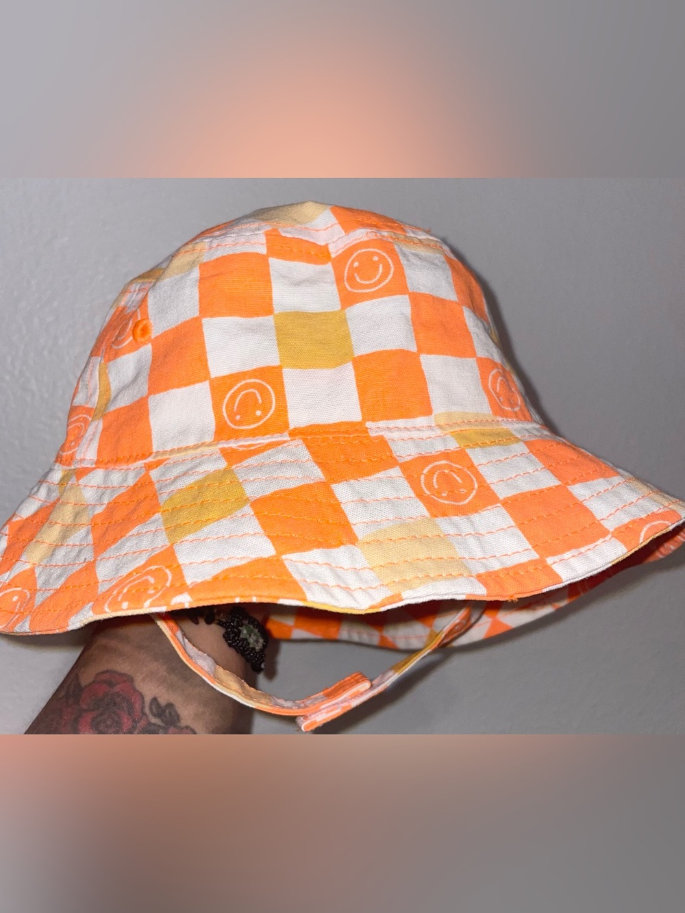Orange & White Checkered Smile Bucket Hat
